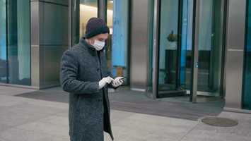 Free download 2019-Ncov: Business Man in Surgical Mask Uses App on Smartphone Walking Outdside | Stock Footage - Videohive video and edit with RedcoolMedia movie maker MovieStudio video editor online and AudioStudio audio editor onlin