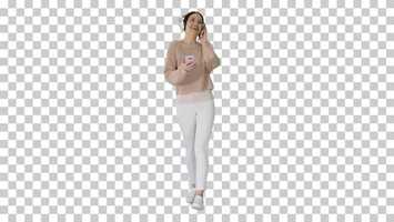 Free download Beautiful Woman Having a Walk while listening, Alpha Channel | Stock Footage - Videohive video and edit with RedcoolMedia movie maker MovieStudio video editor online and AudioStudio audio editor onlin