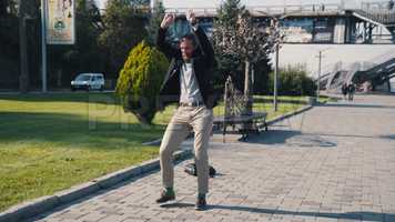 Free download Businessman Dancing On The Street Stock Video video and edit with RedcoolMedia movie maker MovieStudio video editor online and AudioStudio audio editor onlin