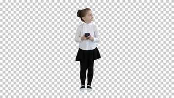 Free download Cute little girl looks in smartphone and, Alpha Channel | Stock Footage - Videohive video and edit with RedcoolMedia movie maker MovieStudio video editor online and AudioStudio audio editor onlin