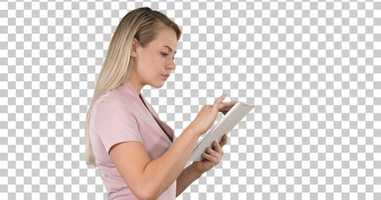 Free download Girl holding digital tablet searching for something, Alpha Channel | Stock Footage - Envato elements video and edit with RedcoolMedia movie maker MovieStudio video editor online and AudioStudio audio editor onlin