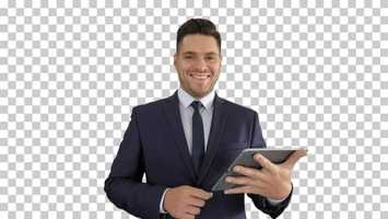 Free download Handsome man swiping pages on tablet and smiling to camera | Stock Footage - Videohive video and edit with RedcoolMedia movie maker MovieStudio video editor online and AudioStudio audio editor onlin