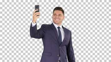 Free download Happy Young Handsome Businessman Recording Vlog with His Phone | Stock Footage - Videohive video and edit with RedcoolMedia movie maker MovieStudio video editor online and AudioStudio audio editor onlin