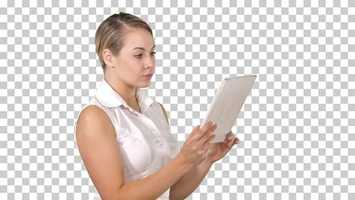 Free download Pretty Woman Standing and Using a Tablet, Alpha Channel | Stock Footage - Videohive video and edit with RedcoolMedia movie maker MovieStudio video editor online and AudioStudio audio editor onlin