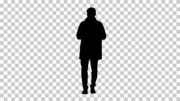 Free download Silhouette Young man wearing trench coat talking to camera | Stock Footage - Videohive video and edit with RedcoolMedia movie maker MovieStudio video editor online and AudioStudio audio editor onlin
