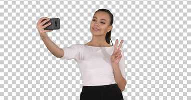 Free download Smiling attractive woman taking a selfie while walking Alpha | Stock Footage - Envato elements video and edit with RedcoolMedia movie maker MovieStudio video editor online and AudioStudio audio editor onlin