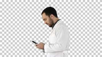 Free download Walking doctor or nurse texting on a cell phone, Alpha Channel | Stock Footage - Videohive video and edit with RedcoolMedia movie maker MovieStudio video editor online and AudioStudio audio editor onlin