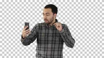 Free download Young Blogger Recording Video on His Phone While Walking Alpha | Stock Footage - Videohive video and edit with RedcoolMedia movie maker MovieStudio video editor online and AudioStudio audio editor onlin