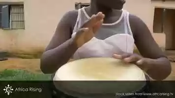 Free download African stock video of a black rural girl playing drum video and edit with RedcoolMedia movie maker MovieStudio video editor online and AudioStudio audio editor onlin