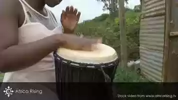 Free download African stock video of black rural girl playing drum video and edit with RedcoolMedia movie maker MovieStudio video editor online and AudioStudio audio editor onlin