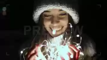 Free download Girl Holding Decorative Lights Stock Video video and edit with RedcoolMedia movie maker MovieStudio video editor online and AudioStudio audio editor onlin