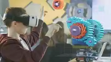 Free download In a Computer Science Class Boy Wearing Virtual Reality Headset Works in Interactive 3D Environment video and edit with RedcoolMedia MovieStudio video editor online and AudioStudio audio editor onlin