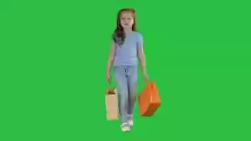 Free download Little girl with shopping bags walking on a Green Screen | Stock Footage - Videohive video and edit with RedcoolMedia movie maker MovieStudio video editor online and AudioStudio audio editor onlin