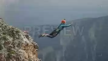 Free download Man Jumping Off A Cliff Stock Video video and edit with RedcoolMedia movie maker MovieStudio video editor online and AudioStudio audio editor onlin
