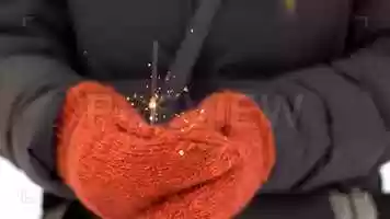 Free download Mittens Holding A Sparkler Stock Video video and edit with RedcoolMedia movie maker MovieStudio video editor online and AudioStudio audio editor onlin