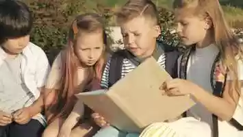 Free download Pupils looking through encyclopaedia outdoors | Stock Footage - Videohive video and edit with RedcoolMedia movie maker MovieStudio video editor online and AudioStudio audio editor onlin
