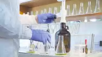 Free download Scientist Titrates Solution Stock Video video and edit with RedcoolMedia movie maker MovieStudio video editor online and AudioStudio audio editor onlin